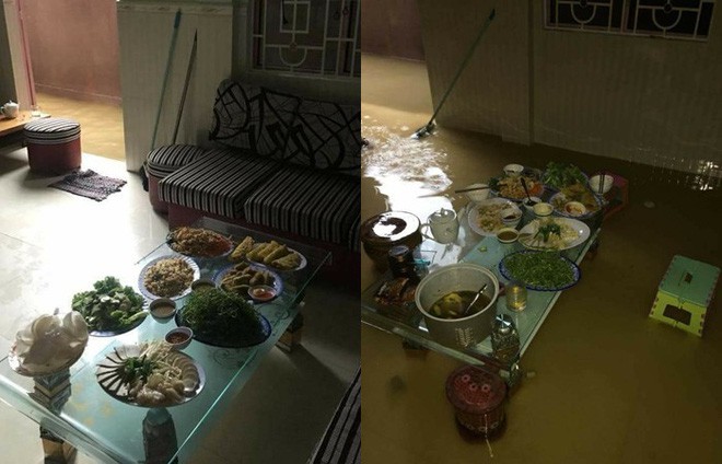 Bi hài ngày mưa lũ: Đang ăn cơm thì nước tràn ngập mâm, một nhà có điện cả làng được nhờ sạc điện thoại - Ảnh 1. Bi hài ngày mưa lũ: Đang ăn cơm thì nước tràn ngập mâm, một nhà có điện cả làng được nhờ sạc điện thoại - Ảnh 1.