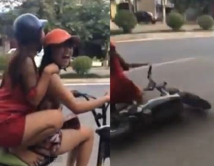 Hai cô gái trẻ “diễn xiếc” trên xe đạp điện gây choáng