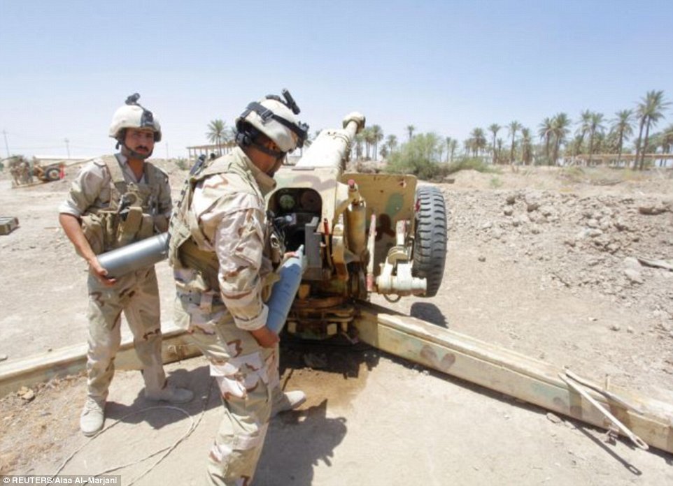 Những hình ảnh chiến binh ISIL sát hại binh sĩ Iraq