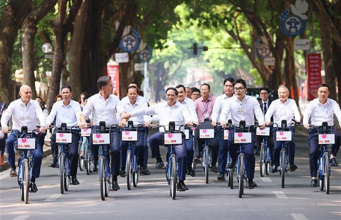 thu tuong pham minh chinh va thu tuong ha lan cung dap xe dao pho ha noi 3 thu tuong pham minh chinh va thu tuong ha lan cung dap xe dao pho ha noi 3