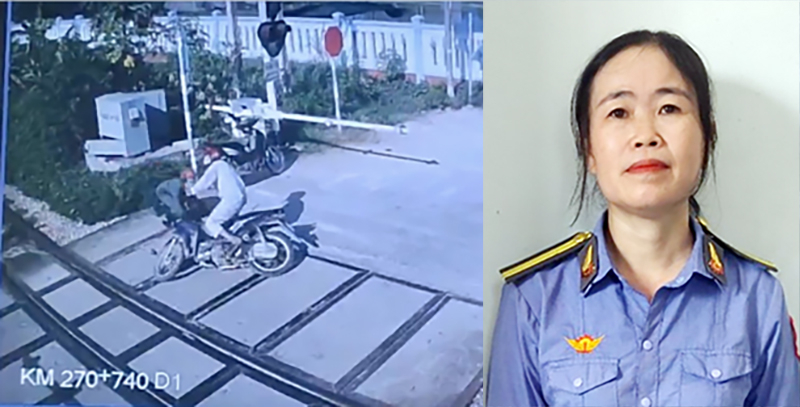 nu nhan vien duong sat dung cam lao ra cuu nguoi dan khi tau hoa den
