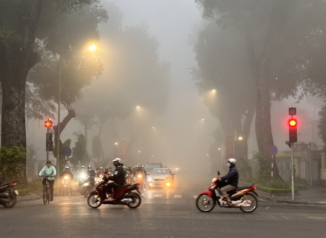 sang som ha noi chim trong suong mu phuong tien di chuyen kho khan11