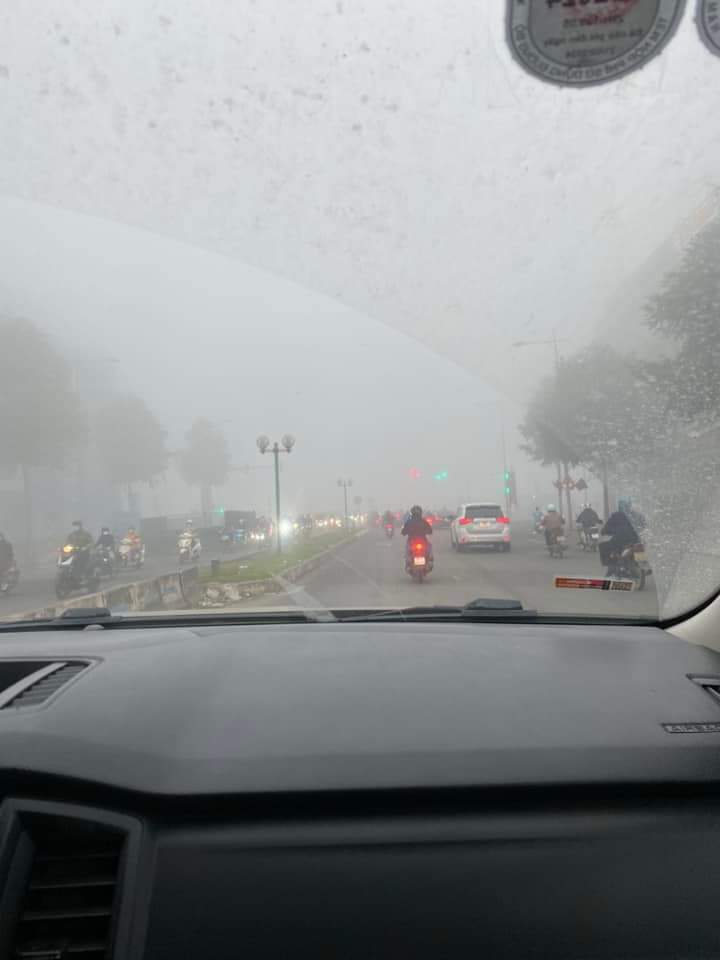 sang som ha noi chim trong suong mu phuong tien di chuyen kho khan20