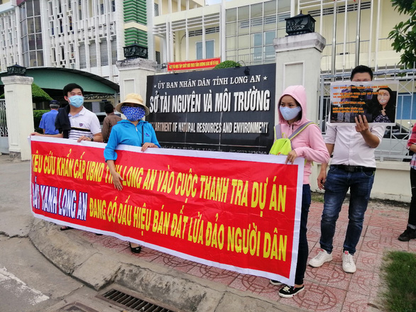 truy tim 2 doi tuong lien quan vu lua dao tai cong ty dat xanh long an1 truy tim 2 doi tuong lien quan vu lua dao tai cong ty dat xanh long an1