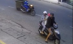 Cặp vợ chồng bồng theo con nhỏ, dàn cảnh trộm điện thoại