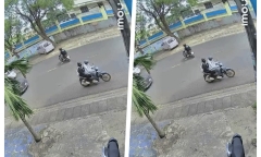 2 nữ sinh chuẩn bị đi học trên chiếc 