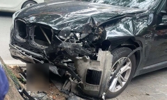 Hiện trường vụ 2 bố con đi xe máy va chạm ô tô BMW, cô gái 18 tuổi bị đứt rời chân phải ở Hà Nội