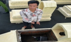 Nam thanh niên mang tài sản trộm cắp giấu ở nghĩa trang