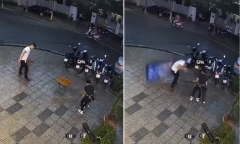 Thu gọn bàn ghế để tránh mưa bão, nam thanh niên bị hộp quảng cáo 