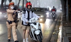 Cho con chưa đủ tuổi lái xe máy đi chúc Tết, cha mẹ vẫn phải chịu trách nhiệm