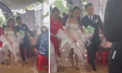 Cô dâu chú rể vùng “rốn lũ” bì bõm trong ngày vui, phản ứng khách mời gây chú ý