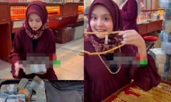 Người phụ nữ gây choáng váng khi mang vali tiền mặt mua 15kg vàng