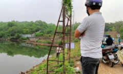 Bàng hoàng phát hiện thi thể người phụ nữ mặc đồ màu hồng dưới đập Bà Mụ