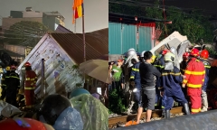 Hiện trường vụ va chạm giữa container với tàu hoả ở Hà Nội, tài xế mắc kẹt trong cabin