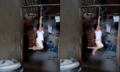 Nguyên nhân bé gái bị trói 2 tay, treo lên xà nhà