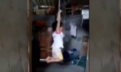 Công an xác minh clip cháu bé bị trói 2 tay, treo lên xà nhà