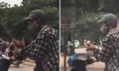 Video: Thanh niên bất chấp nguy hiểm vừa đi xe máy vừa chơi điện tử