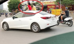 Ủy ban ATGT Quốc gia vào cuộc vụ 2 bé gái ngồi trên nóc xe ô tô Mazda