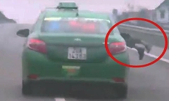 Hà Nội: Bất khẩn cấp tài xế taxi Mai Linh hất cảnh sát lên nắp capo, chạy suốt 20 km
