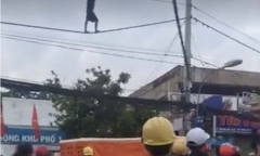 Thanh niên nghi ngáo đá đu mình trên dây điện