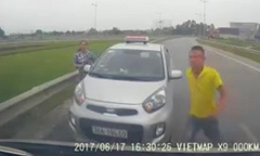Tài xế taxi chạy ngược chiều, vung gậy sắt đe dọa bị tước bằng lái 2 tháng