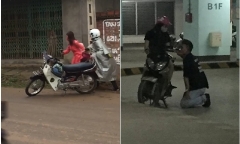 Chàng trai mặc áo mưa quỳ gối xin lỗi bạn gái giữa đường mưa bẩn gây xôn xao