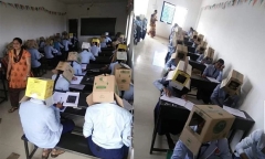 Giáo viên bắt học sinh đội thùng carton lên đầu để chống gian lận khiến nhiều người tức giận