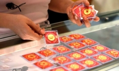 Vì  sao có tục mua vàng ngày vía thần tài?