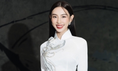 Không còn cắt xẻ táo bạo, Hoa hậu Thùy Tiên quay trở lại với áo dài truyền thông khi đi sự kiện
