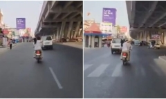 Clip: Vợ ngồi sau xe máy, bất ngờ rút dép đánh chồng tới tấp gây bão mạng xã hội
