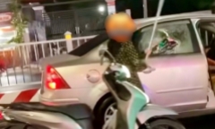 Vụ người phụ nữ lái xe máy tạt đầu, đập bể kính ô tô giữa đường: Là vợ của tài xế