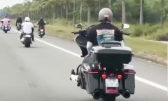 Tiết lộ ban đầu về người buông hai tay khi lái xe mô tô trên đường ven biển ở Quảng Nam