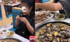 Đi ăn buffet hải sản, cô gái vô tư đánh chén tận 100 con bào ngư, phản ứng khó chịu của ông chủ gây tranh cãi
