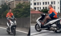 Video: Nam thanh niên ôm bé trai, phóng xe máy vun vút trên cao tốc