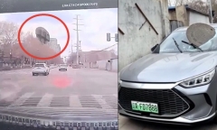 Clip: Nắp cống kim loại bất ngờ bật lên từ mặt đường, đâm vào kính lái ô tô