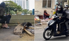 Hà Nội dưới cái lạnh 8 độ C:  Người dân đốt lửa sưởi ấm, trùm cả chăn ra đường để chống rét