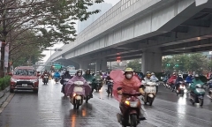 Miền Bắc mưa nhỏ rải rác, giảm nhiệt trong ngày làm việc đầu tiên sau Tết