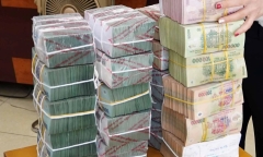 Đổi tiền lẻ dịp Tết để ăn chênh lệch có bị phạt không?