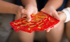 Nguồn gốc và ý nghĩa của tục lì xì ngày Tết mọi người cần biết