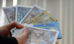 Đổi tiền lẻ lấy tiền chênh lệch kiếm lời dịp Tết Nhâm Dần 2022, bị phạt bao nhiêu?
