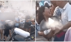 Bố mẹ giành giật con ngay trước cổng trường, thái độc của đứa trẻ khiến ai nấy đều nghẹn lòng