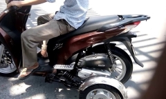 Người khuyết tật đi xe ba bánh có yêu cầu bằng lái không?