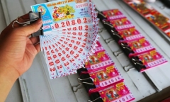 Chồng mua vé số, tiền trúng thưởng là tài sản riêng hay chung?