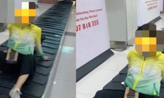 Xác minh vụ cô gái ngồi phản cảm trên băng chuyền hành lý sân bay