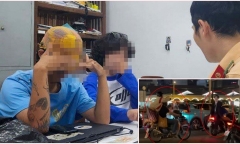 Xử phạt cô gái chở thanh niên không đội mũ bảo hiểm, ngồi ngược trên xe máy ở TP.HCM