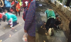Chàng trai quỳ dưới mưa gần một ngày để cầu xin bạn gái quay lại
