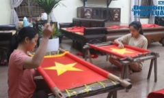 Về ngôi làng thêu lên 