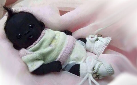Sốc với ảnh em bé Nam Phi da đen nhất thế giới