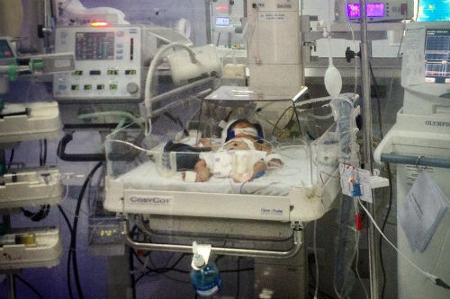 Xúc động chuyện “rụng tim” ông bố trẻ đưa vợ đi sinh