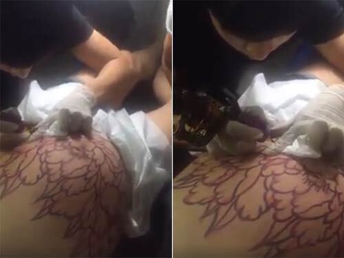 Sốc với bà bầu 8 tháng vẫn xăm hoa mẫu đơn kín bụng